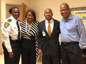 A group of people standing next to each other.