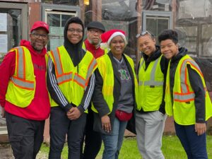 A group of people standing next to each other.