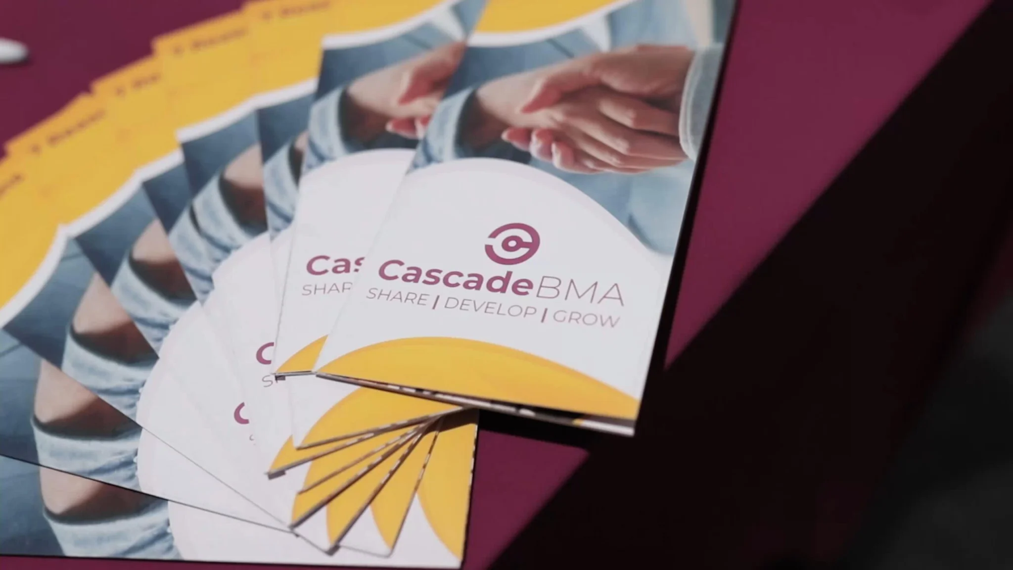 A stack of brochures sitting on top of each other.