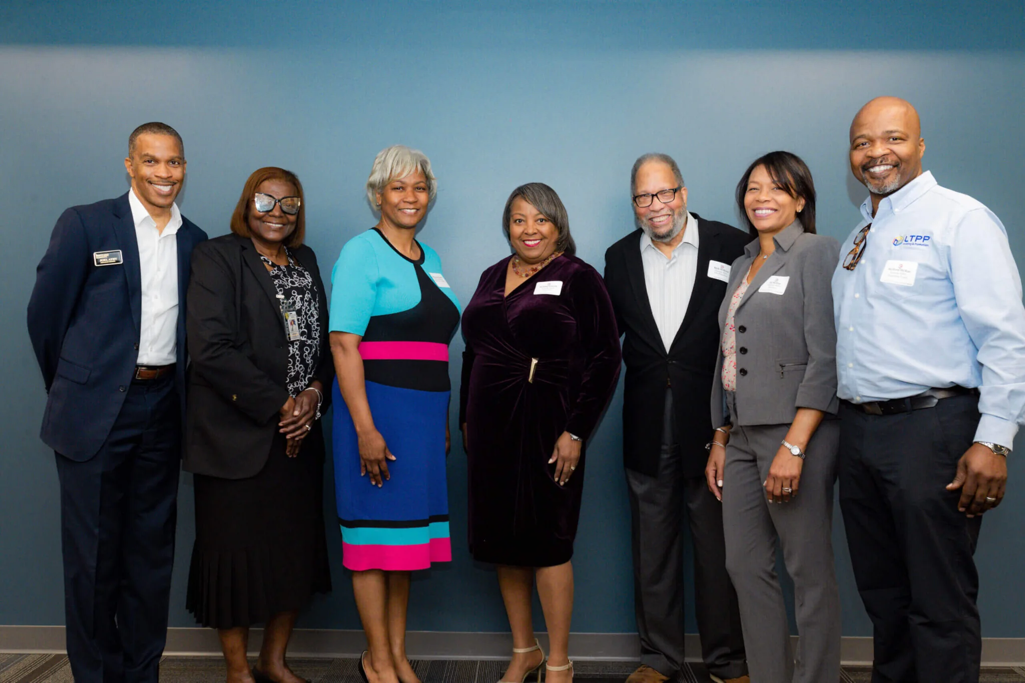 A group of people standing next to each other.